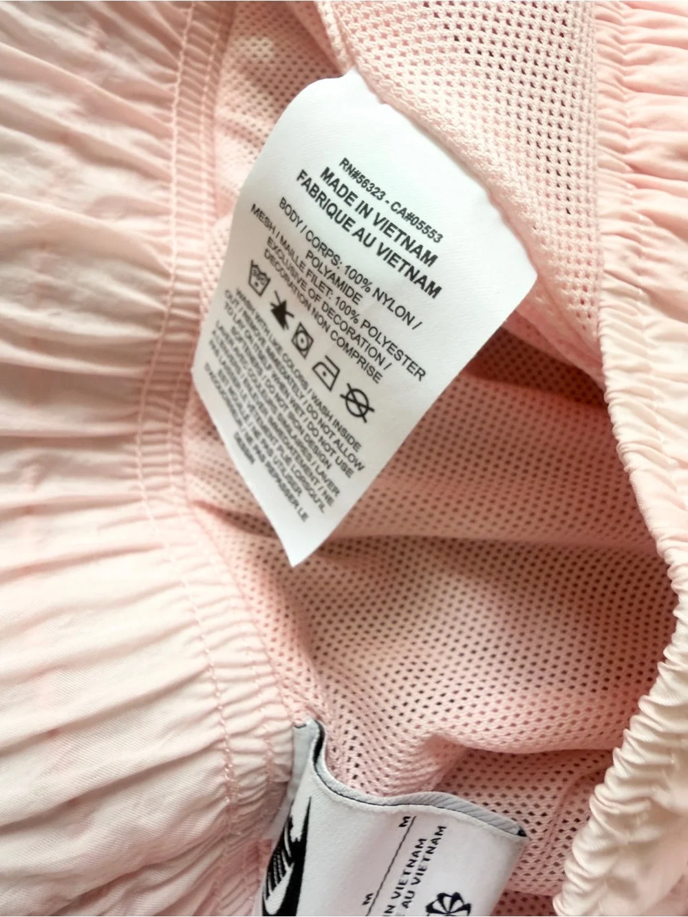 Nike MEDIUM high rise clash black swoosh light pink pocketed shorts